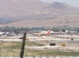 Passenger jet taxiing to gate at airport