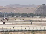 Passenger jet on final approach and taxi to gate