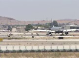 Passenger jet on final approach and taxi to gate