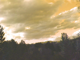 time Lapse Clouds over mountains at sunset