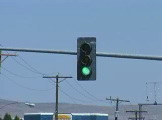 Traffic light changing green to yellow to red