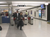 People exiting/entering BART station in San Francisco