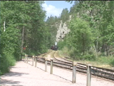 old train entering train station