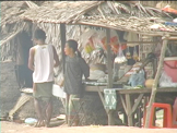 kids operating a country cambodian convience store