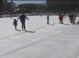 people skating in outside rink