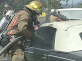 Fire Fighters putting out car fire