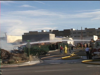 Fire Fighter fighting warehouse fire