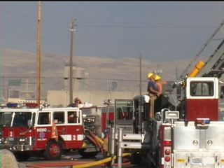 Fire Fighter fighting warehouse fire