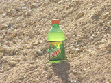 gun exploding can of soda pop