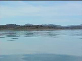 On the water. A calm mountain lake