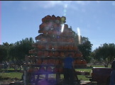 Scenes from a pumpkin patch. A tower of pumpkins.